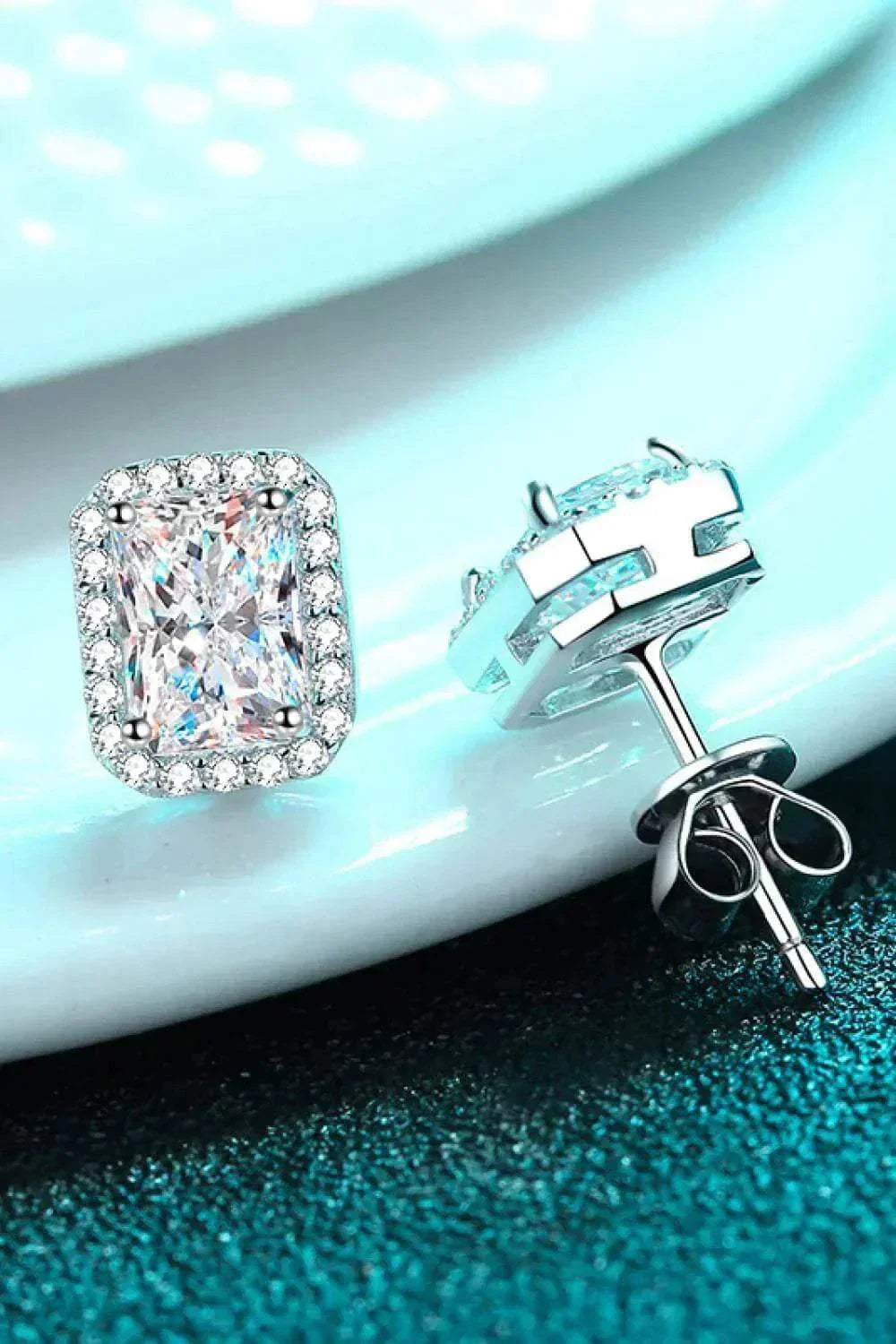 Two 1.05 CTW DEW Emerald Cut Rectangular Colorless Moissanite Halo Stu