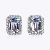 Pair of 1.05 CTW DEW emerald cut rectangular colorless moissanite halo stud earrings in 925 sterling silver with push back clasp