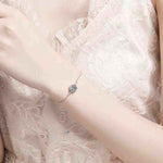 1 CTW Moissanite halo bracelet in adjustable 925 sterling silver bolo chain with symmetrical accent stones