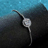 1 CTW moissanite halo bracelet with symmetrical accent stones in adjustable sterling silver bolo chain