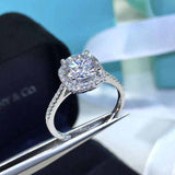 1.5 CTW DEW Colorless Round Brilliant Cut Moissanite Sterling Silver O