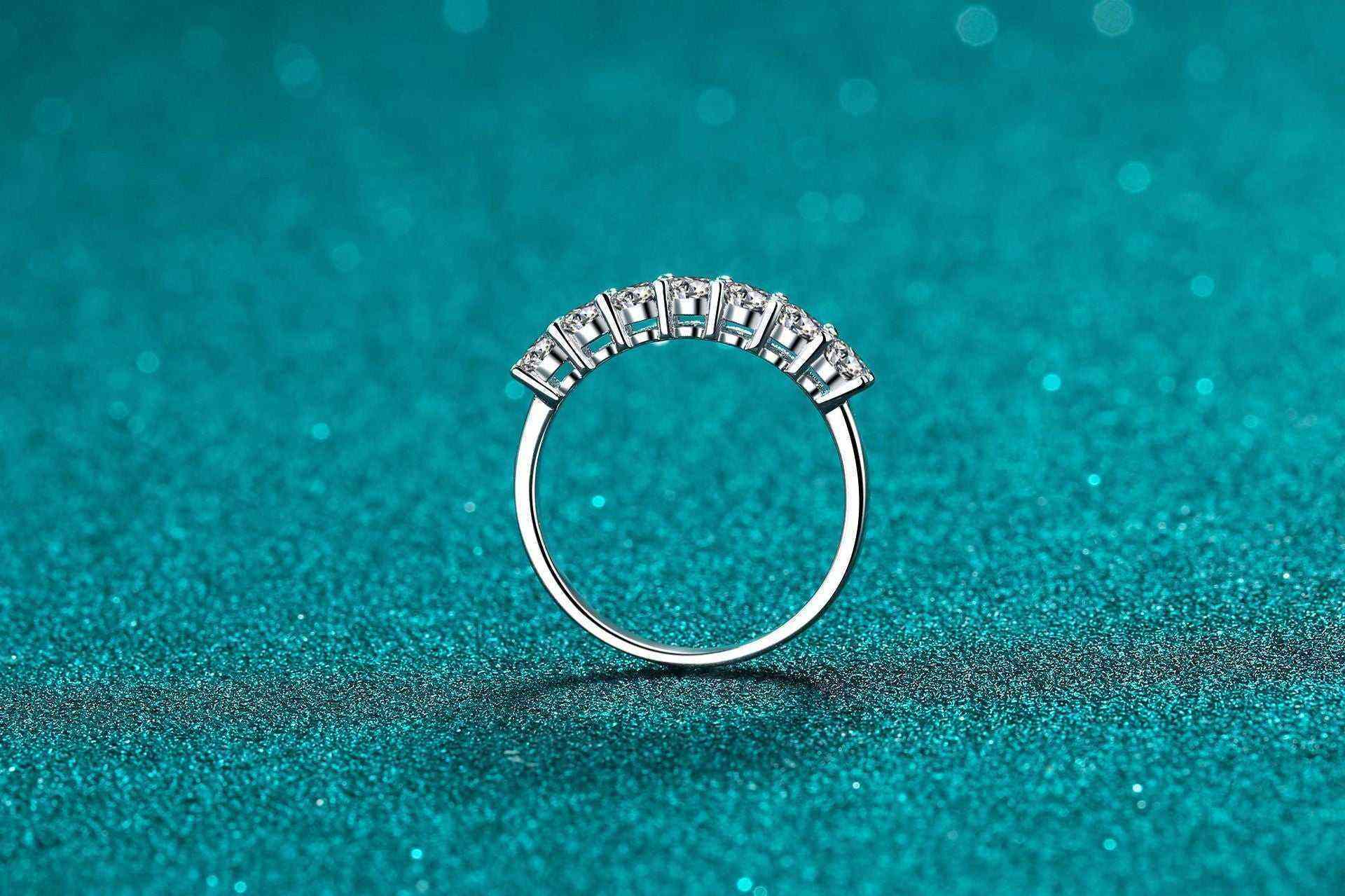 0.7 CTW DEW seven-stone round moissanite semi-eternity band ring in platinum plated S925 sterling silver