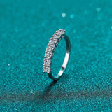 0.7 CTW DEW seven-stone round moissanite wedding anniversary band in platinum plated S925 sterling silver