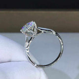 0.8 CTW colorless round brilliant cut moissanite sterling silver solitaire engagement ring with pave set accent stones