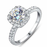 0.5 CTW DEW colorless round brilliant cut moissanite halo engagement ring in sterling silver with pavé cubic zirconia accents