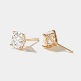 3 carat lab grown diamond stud earrings set in 14k gold four-prong martini setting