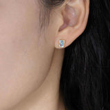 Emerald Cut Blue Topaz Stud Earrings in 14K Yellow Gold