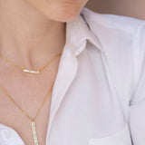 Emlyn Gold Vermeil Pendant necklace with minimalist bar design on fine gold chain worn with white shirt