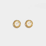 Alex Gold Vermeil stud earrings with uncut diamonds and pave champagne diamond accents in a concentric design