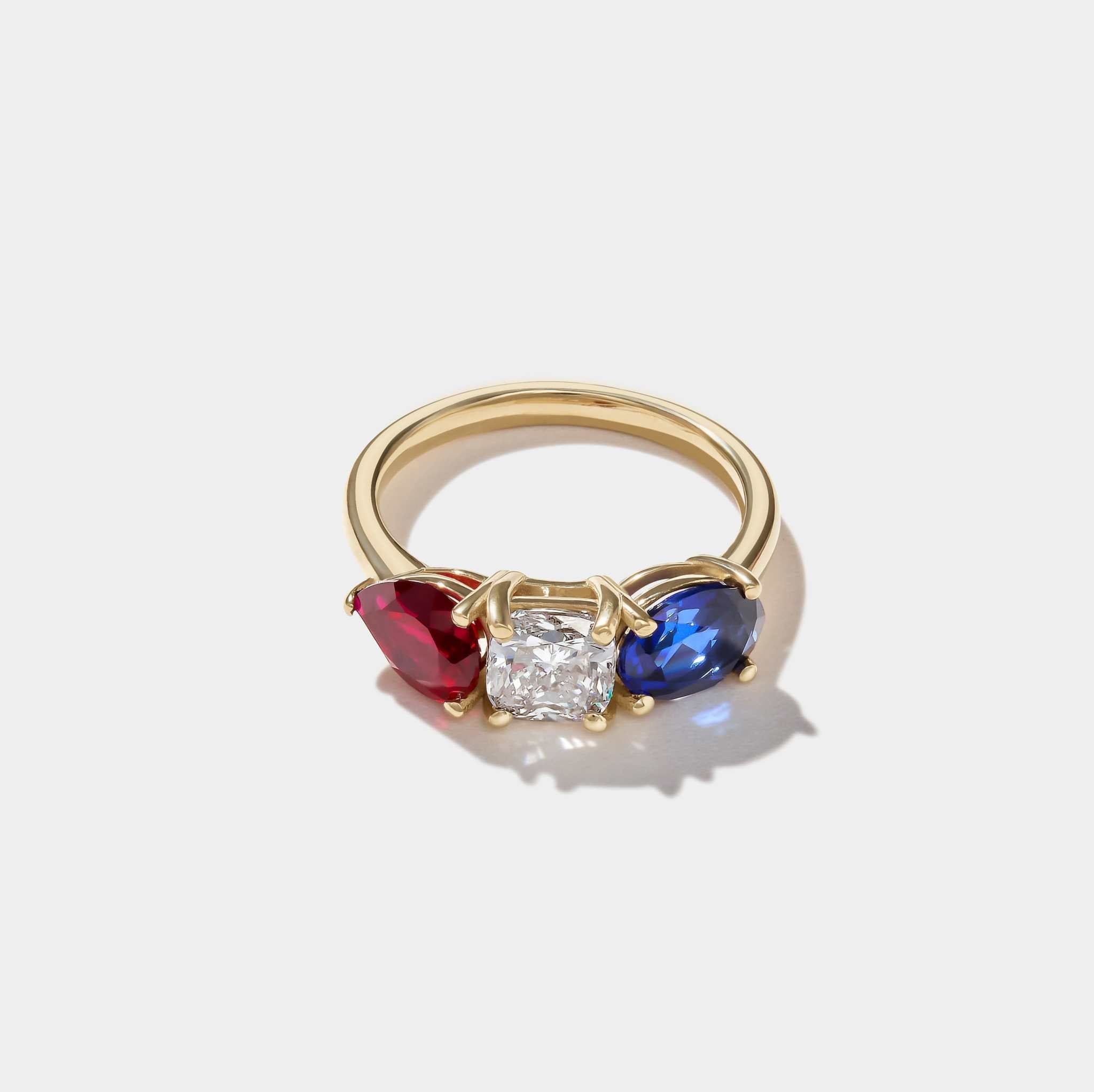 Americana Signature Three-Stone Ring with 14k gold, cushion-cut diamond, ruby, and sapphire gemstones