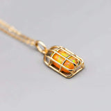 Bird Cage Mexican Fire Opal Necklace pendant in 14K yellow gold with orange opal gemstone