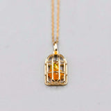 Bird Cage Mexican Fire Opal Necklace pendant in 14K yellow gold with orange opal stone