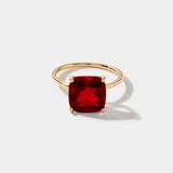 Boston Red Ring featuring a 14k gold band and cushion cut lab-grown ruby centerpiece.