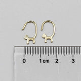 18k yellow gold cat tail hook earrings with drop style shown next to centimeter ruler for size reference