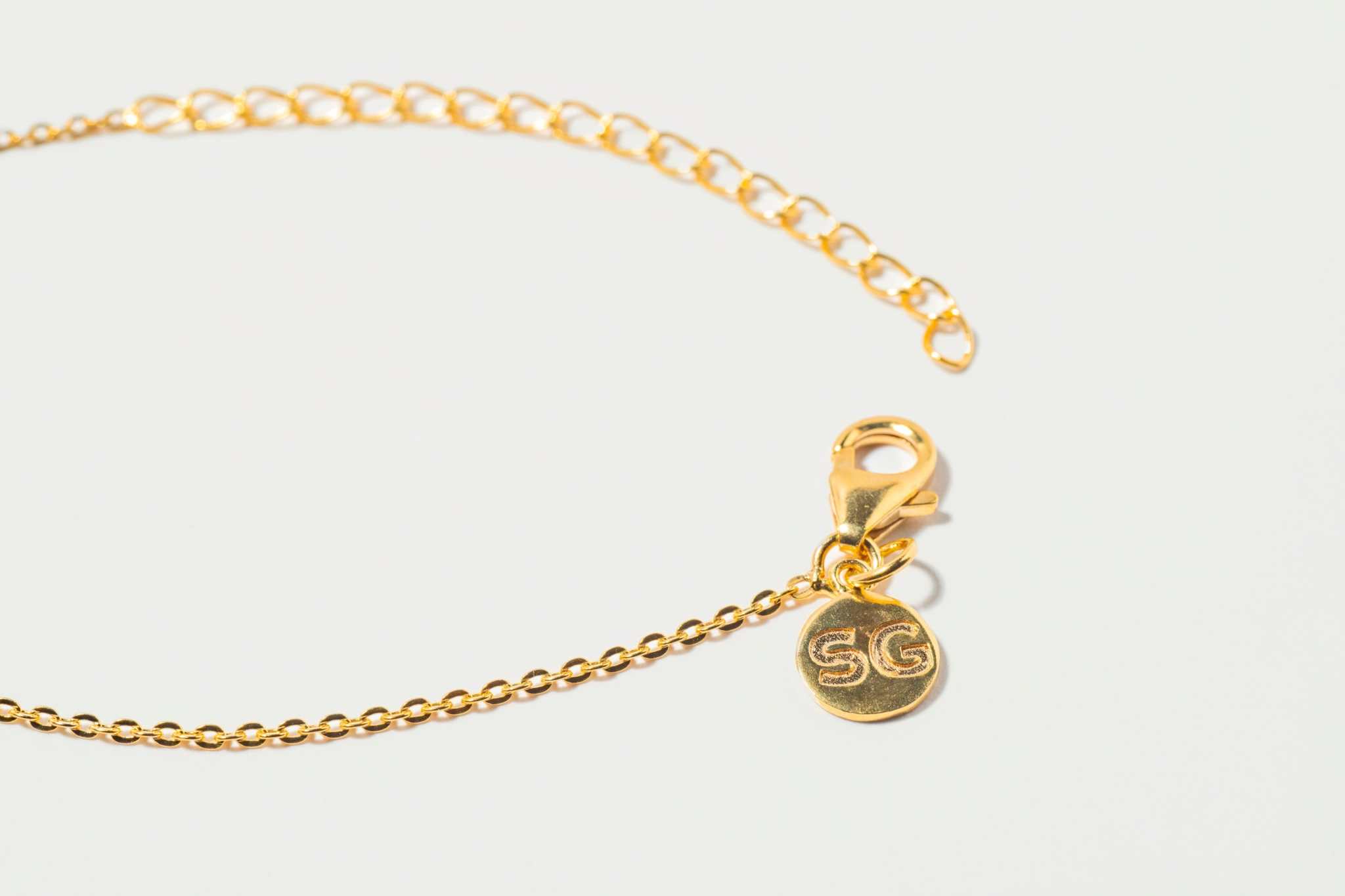 Emlyn Gold Vermeil pendant necklace with fine gold chain and clasp tag.