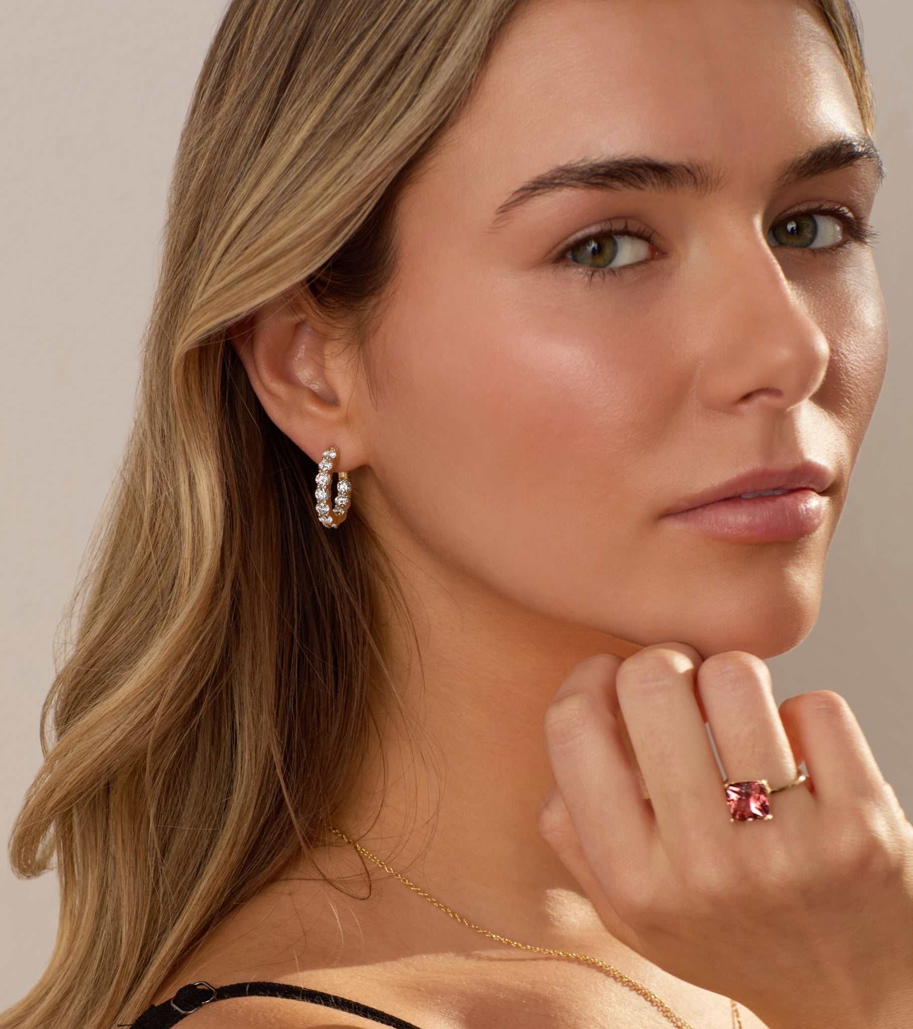 Cairn 3 carat diamond inside outside hoop earrings in 14k gold worn by woman