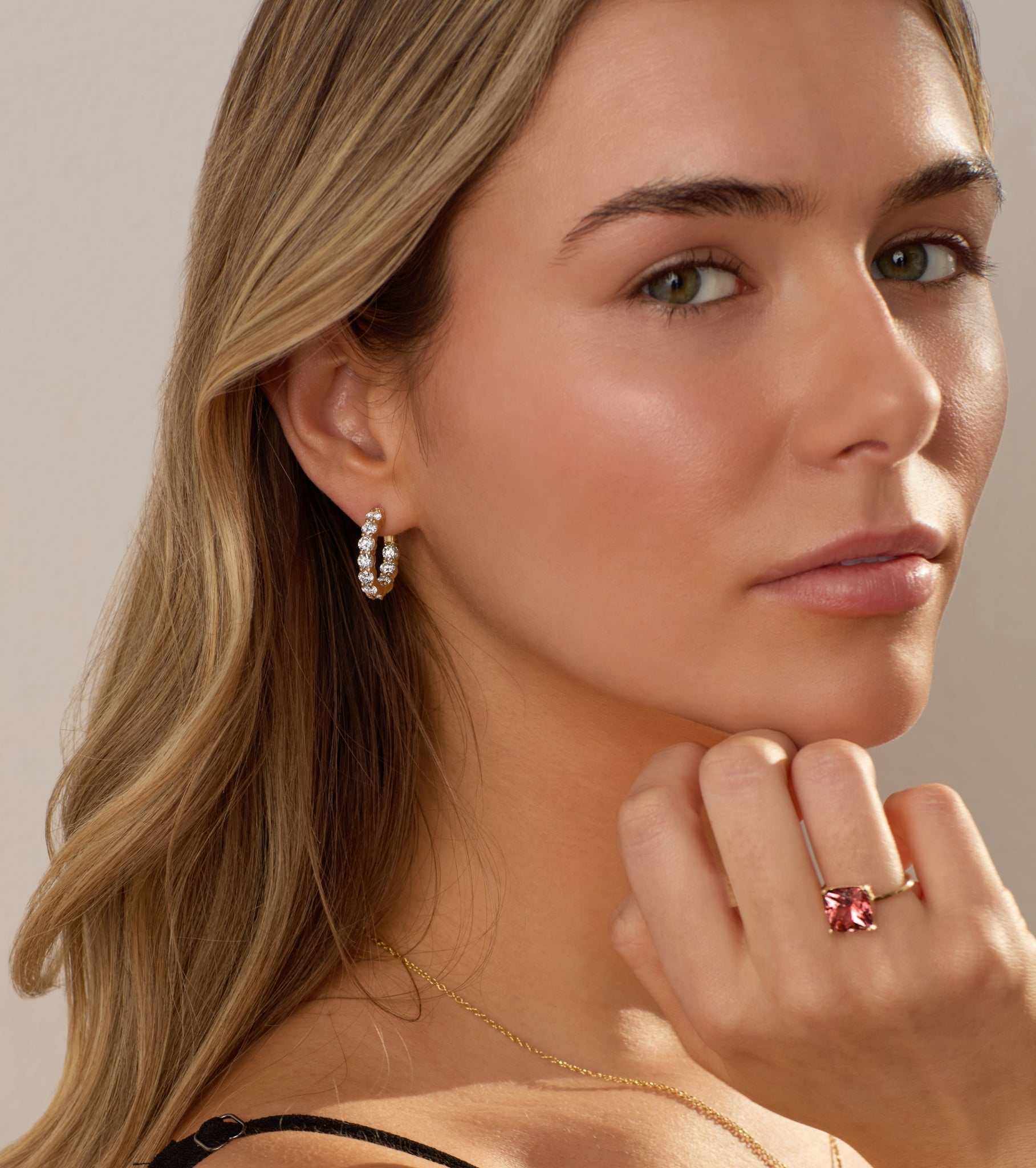 Cairn 3 Carat Diamond inside outside hoop earrings in 14k gold worn by woman