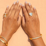 Geluk Gold Vermeil Bangle bracelet on wrist showcasing intricate craftsmanship and elegant design