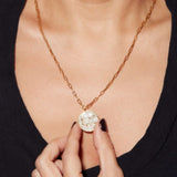 Gemini Gold Vermeil pendant necklace with raw diamonds on an 18k gold vermeil chain worn on a woman's neck