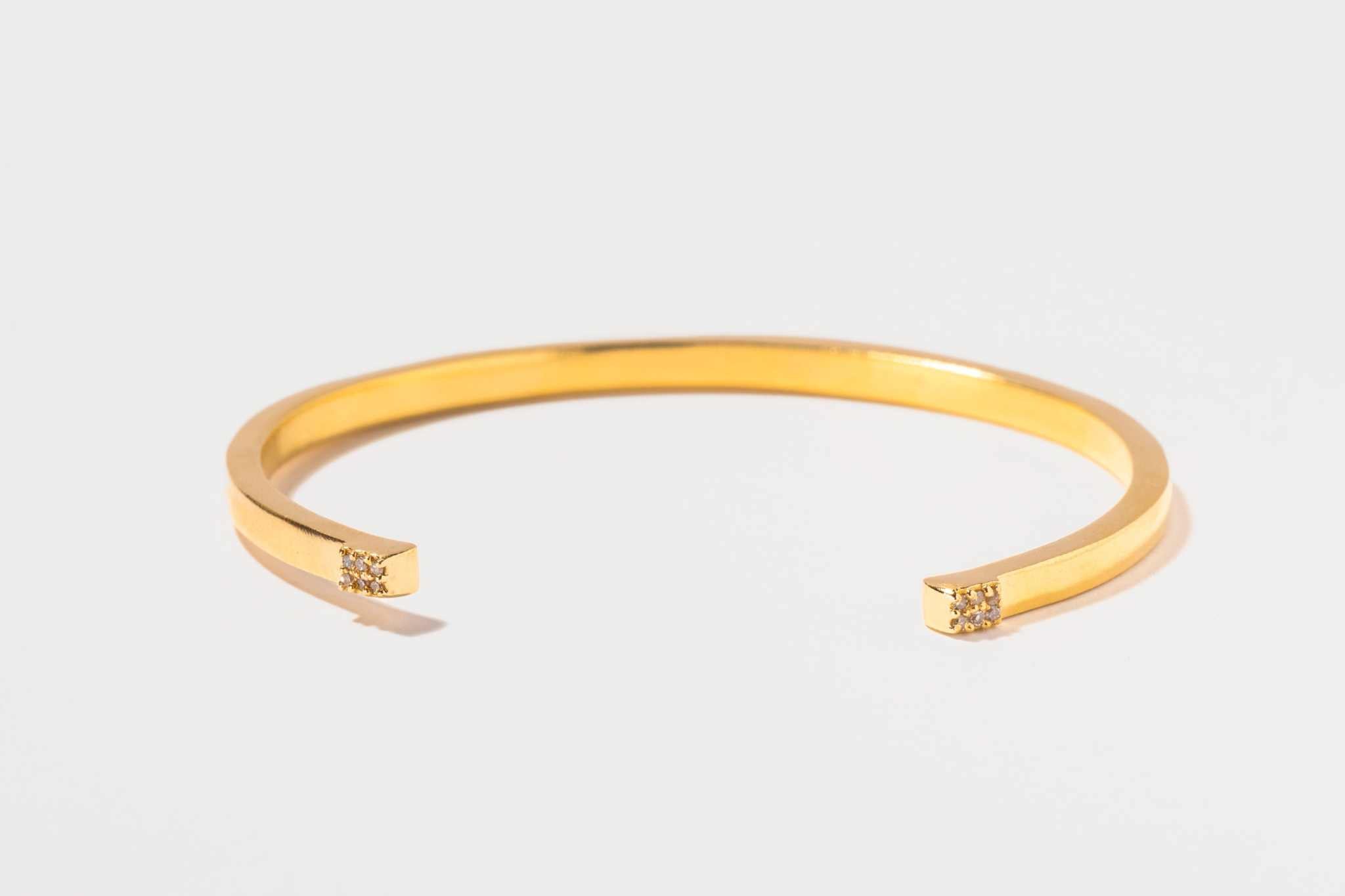 Hapur Gold Vermeil Bangle bracelet with slim open design and diamond accents