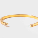 Hapur Gold Vermeil Bangle bracelet with slim open design and diamond accents
