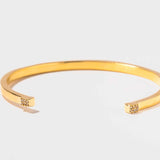 Hapur Gold Vermeil Bangle bracelet with slim open design and diamond accents
