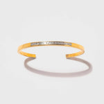 Slim Hapur Gold Vermeil Bangle Bracelet with diamond accents and 18K gold finish