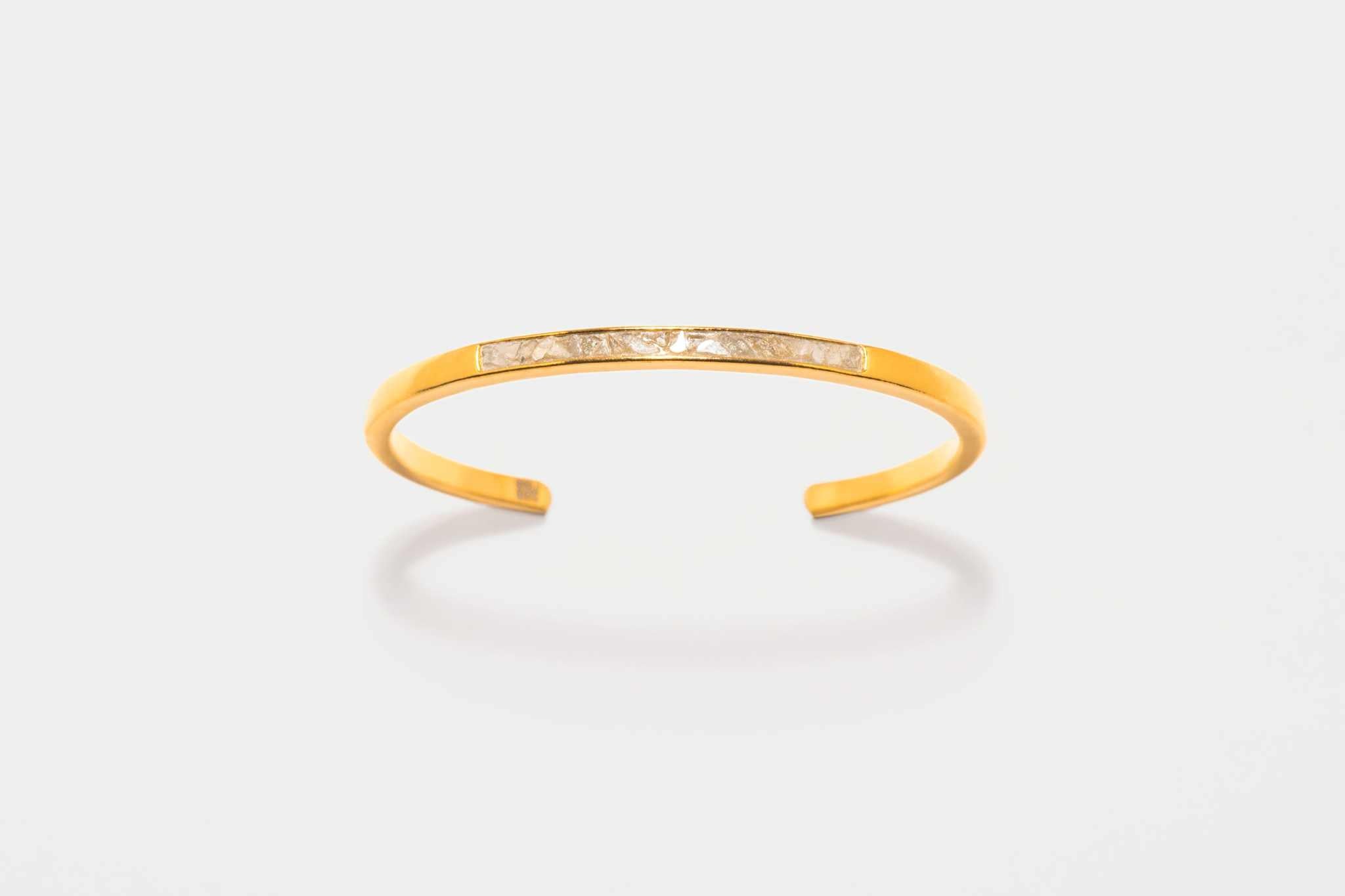 Hapur Gold Vermeil Bangle bracelet with a slim design featuring raw uncut diamonds and 18K gold layered vermeil on sterling silver.