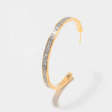 Hapur Gold Vermeil Hoop Earrings with sliced raw uncut diamonds, silver resin, and 18k gold layer, 2.2-inch diameter, elegant and versatile design.