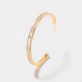 Hapur Gold Vermeil hoop earring with sliced raw uncut diamonds and 18K gold layer on sterling silver base.