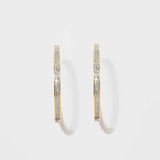 Pair of Hapur Gold Vermeil Hoop Earrings with textured silver resin and 18k gold edges.