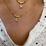 Neoma Gold Vermeil Pendant necklace featuring 18k gold crescent moon and star charms on delicate gold chains