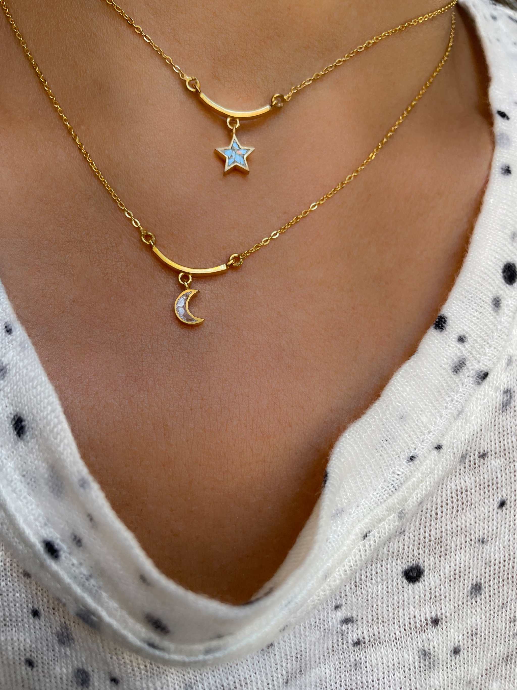 Neoma Gold Vermeil Pendant necklace featuring 18k gold crescent moon and star charms on delicate gold chains