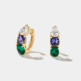 14k gold Hydrangea Earrings with pear-shaped diamonds, oval emeralds, and cushion-cut iolite gemstones