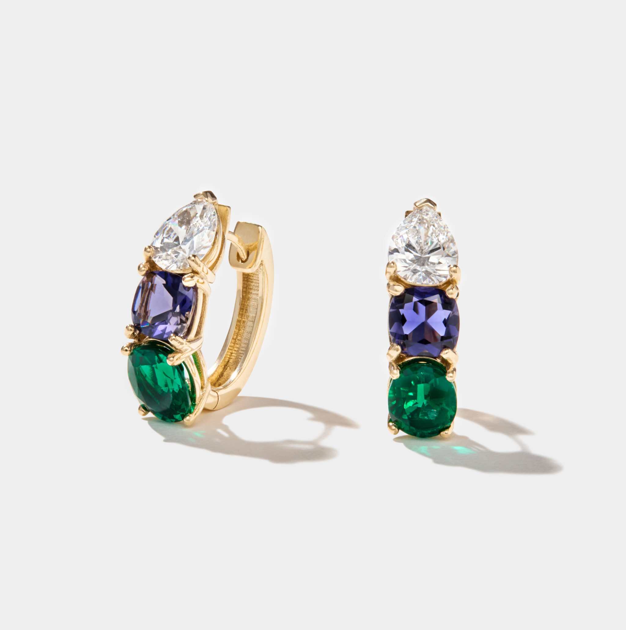 14k gold Hydrangea Earrings with pear-shaped diamonds, oval emeralds, and cushion-cut iolite gemstones
