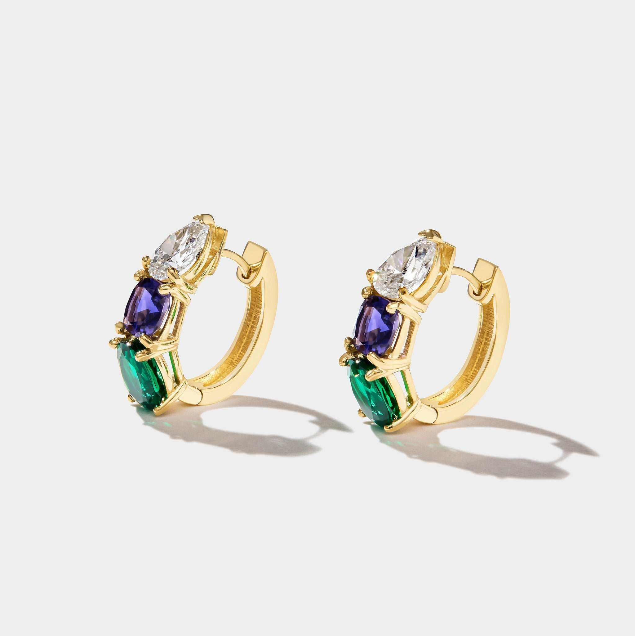 14k gold Hydrangea Earrings with pear-shaped diamonds, natural iolite, and lab-grown emeralds in a tri-color design
