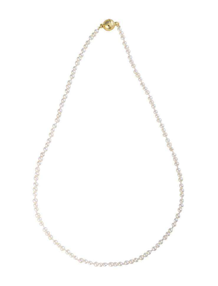 Signature freshwater pearl strand necklace with tiny white pearls and gold magnetic clasp