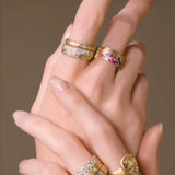 Sapphire Scattered Rainbow Cigar Band in 14K Gold