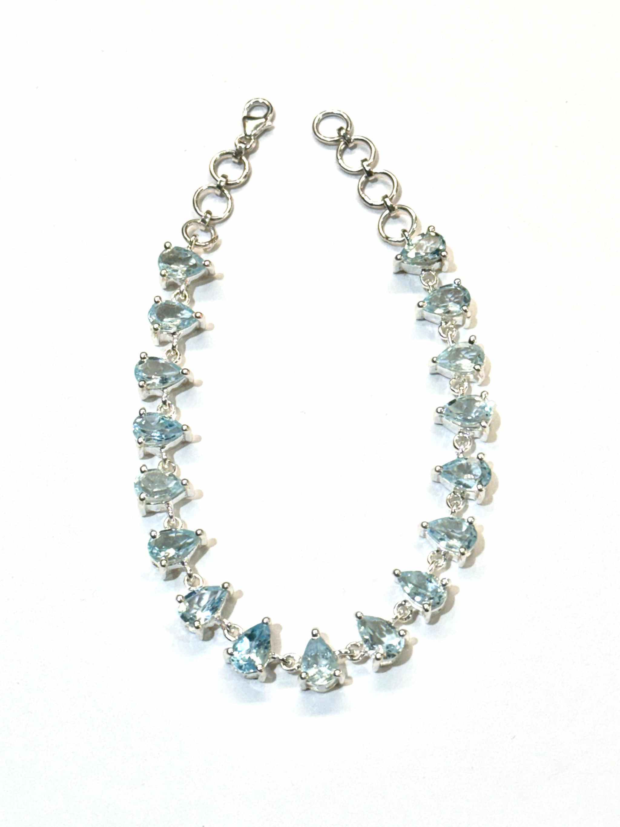 18.7 CTW pear cut sky blue topaz bracelet in 925 sterling silver adjustable chain