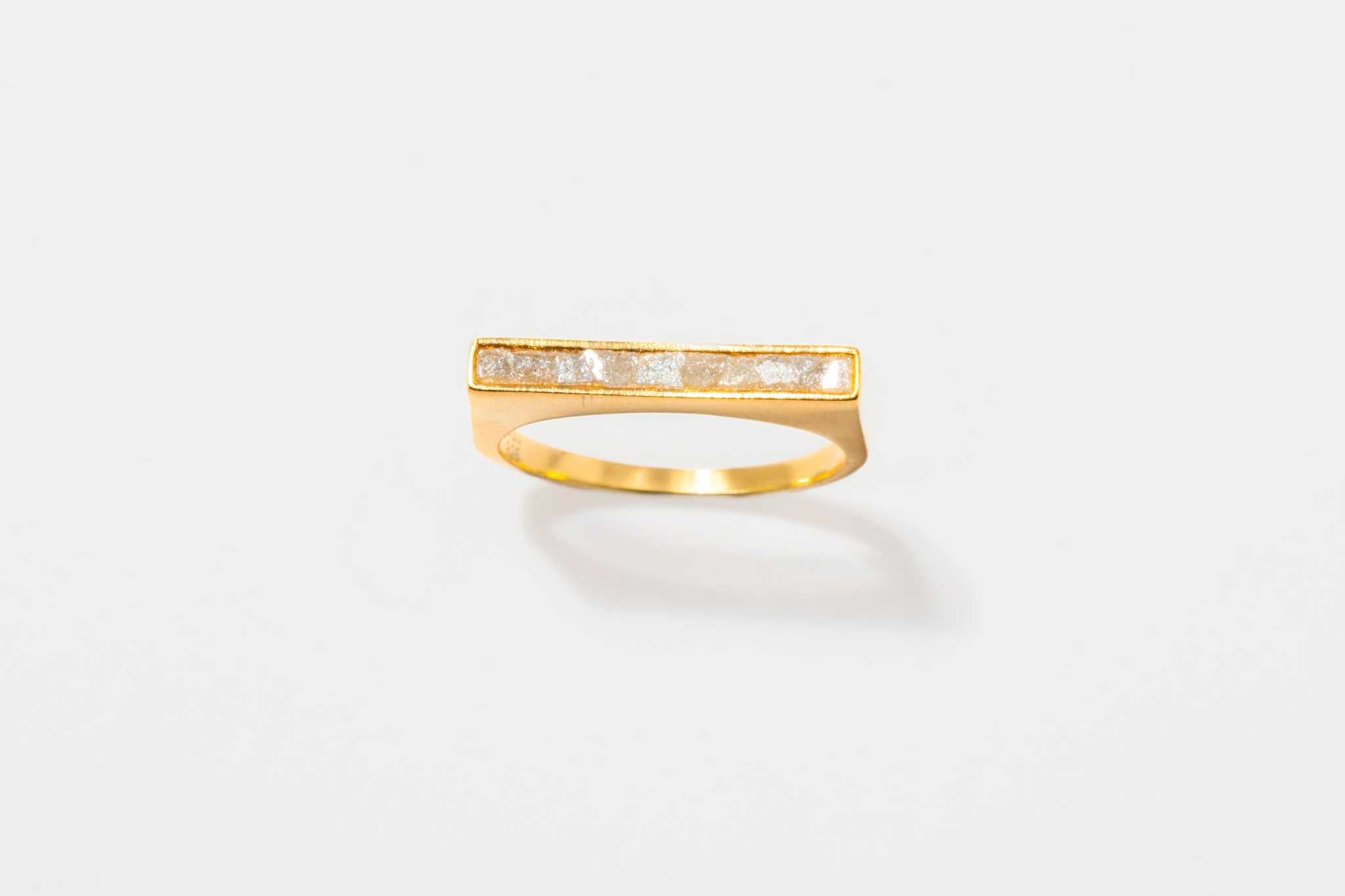 Michelle Gold Vermeil ring with thin diamond line and 18k gold trim on white background
