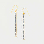 Miladi large gold vermeil earrings with long, geometric design and raw uncut diamonds in silver resin