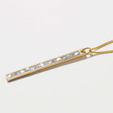 Miladi Gold Vermeil Necklace with rectangular pendant featuring sliced raw uncut diamonds and pave champagne diamonds in 18K gold vermeil.