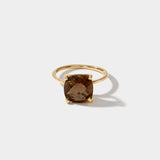 14k solid gold ring with a 10x10mm cushion-cut smokey quartz stone on a white background
