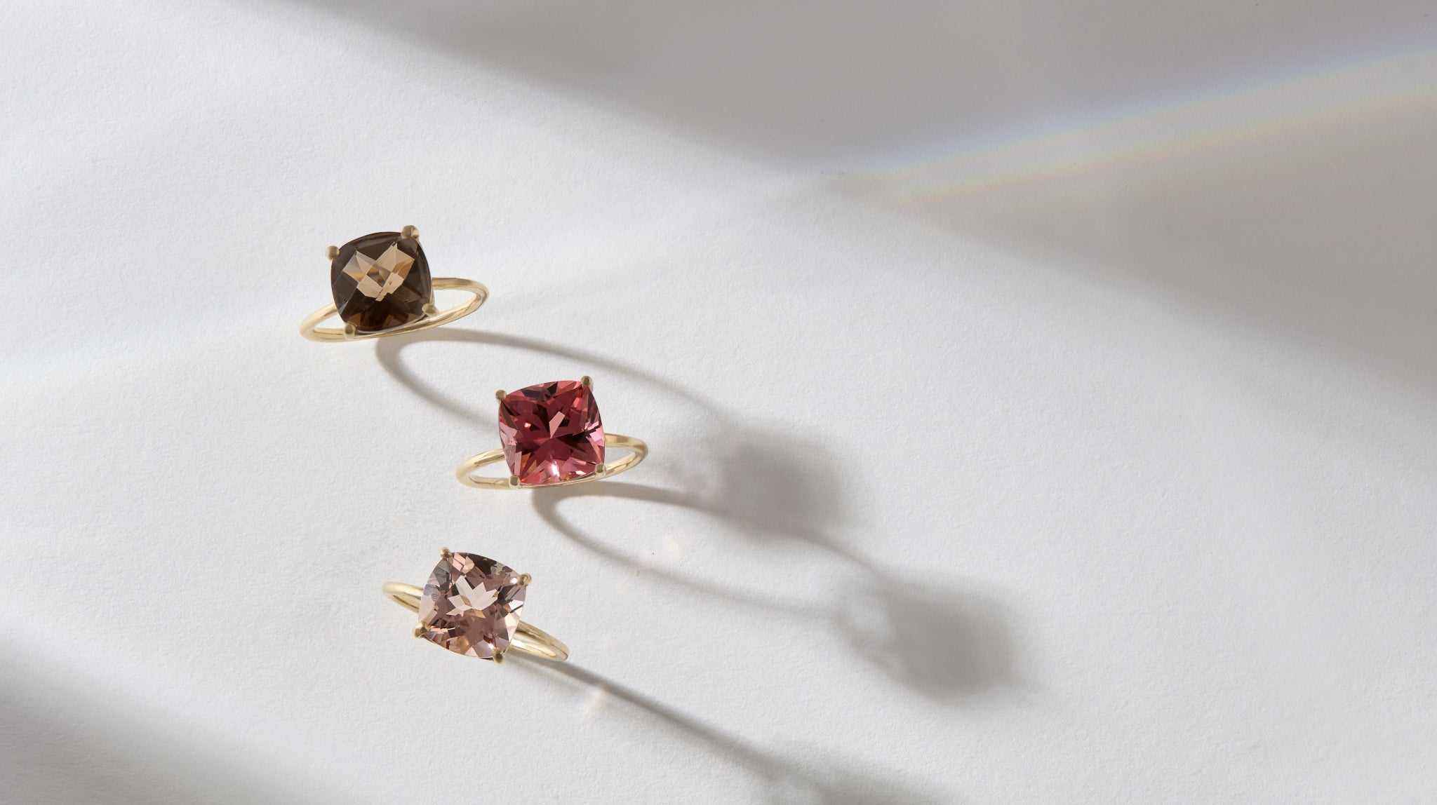 Connecticut Coast Morganite Ring with 14k gold band and cushion cut peach morganite stone.