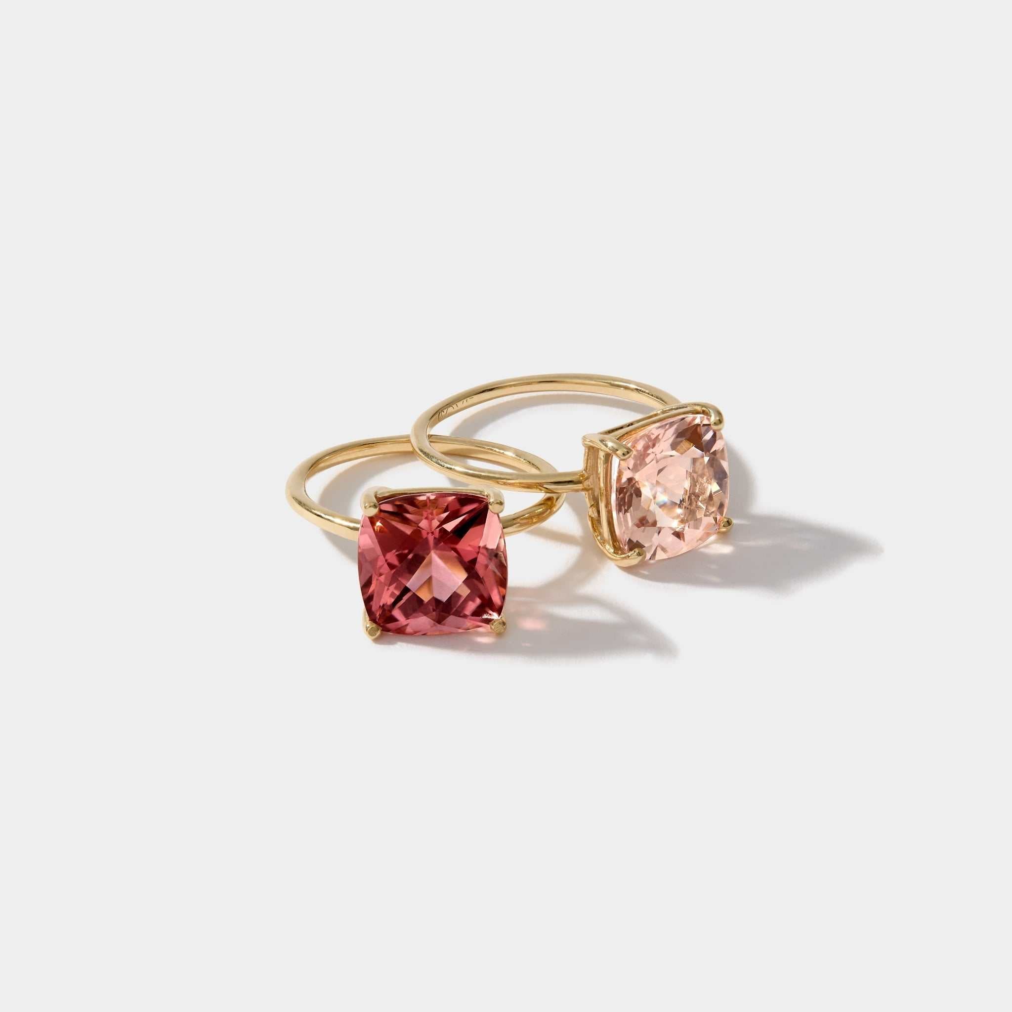Two Nantucket Red Rings featuring cushion-cut pink tourmaline gemstones set in 14k solid gold bands against a white background.