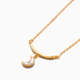 Neoma Gold Vermeil Pendant necklace with sliced raw uncut diamonds and rose gold resin crescent moon charm on a gold chain