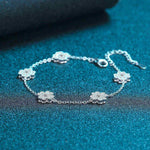Adjustable 0.64 CTW colorless moissanite lucky clover freesia flower bracelet in 925 sterling silver rolo chain
