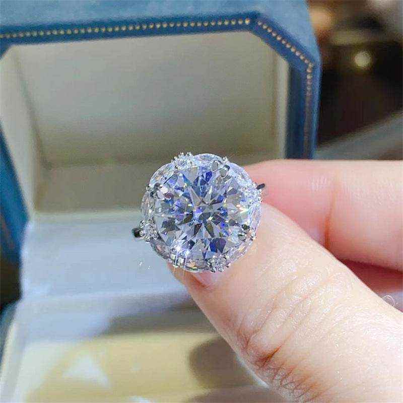 4.75 CTW DEW round brilliant cut moissanite halo engagement ring in sterling silver
