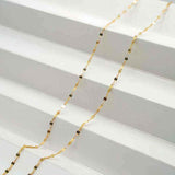 18K yellow gold keyhole lips link chain necklace with delicate polished finish and spring ring closure on white background