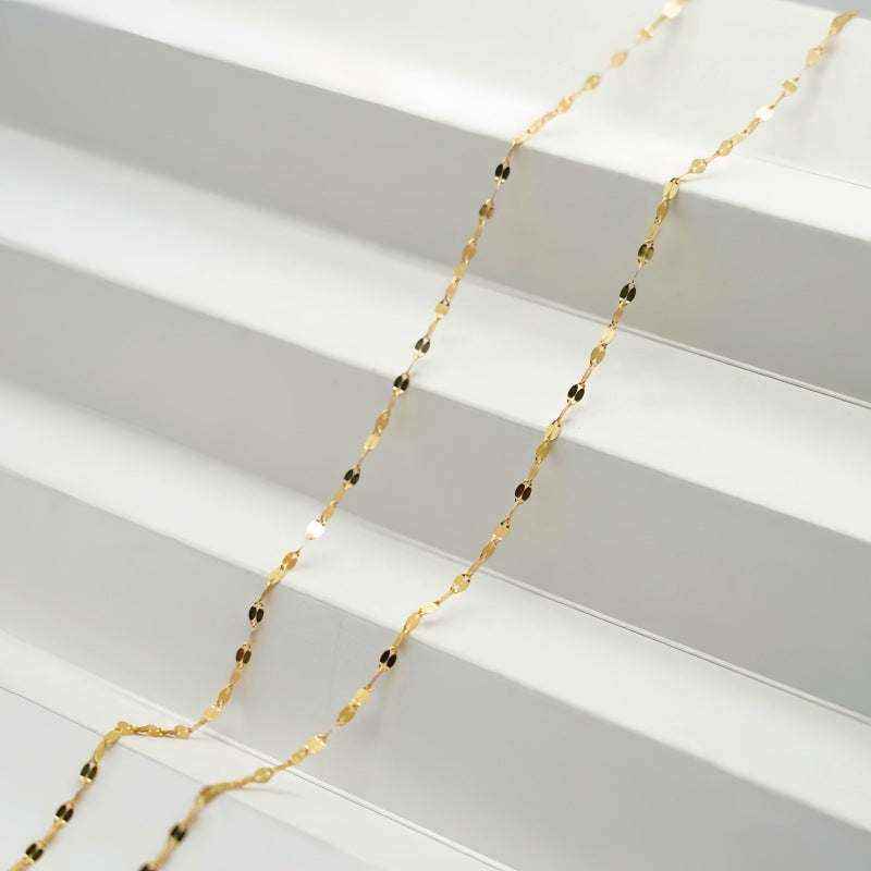 18K yellow gold keyhole lips link chain necklace with delicate polished finish and spring ring closure on white background